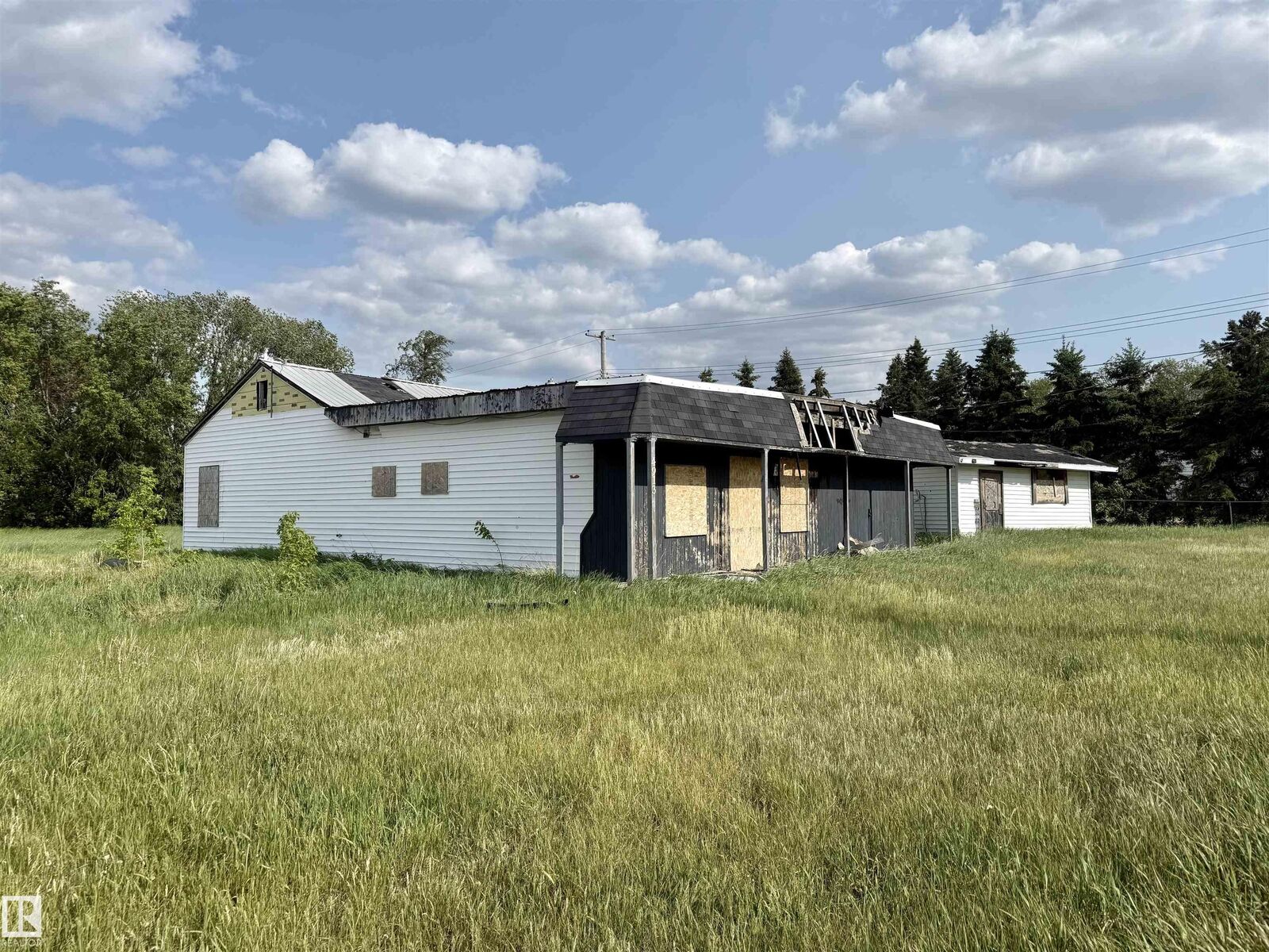 Property Photo:  4913 & 4909 49 Avenue  AB T0A 1P0 