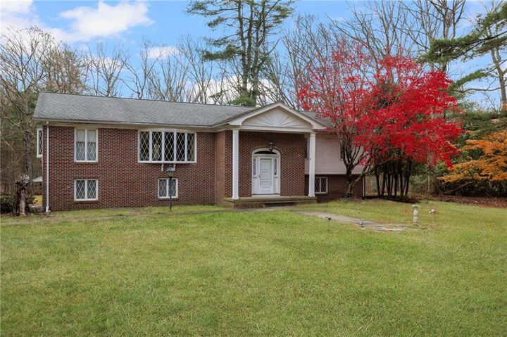 Property Photo:  46 Woodsong Drive  RI 02857 