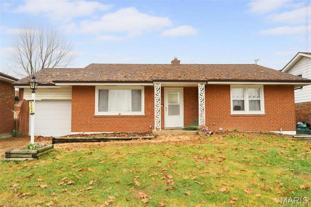 Property Photo:  9235 Filibert Drive  MO 63137 