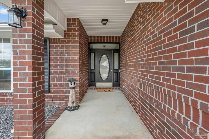 Property Photo: 9773 Leeward Way FL 32566