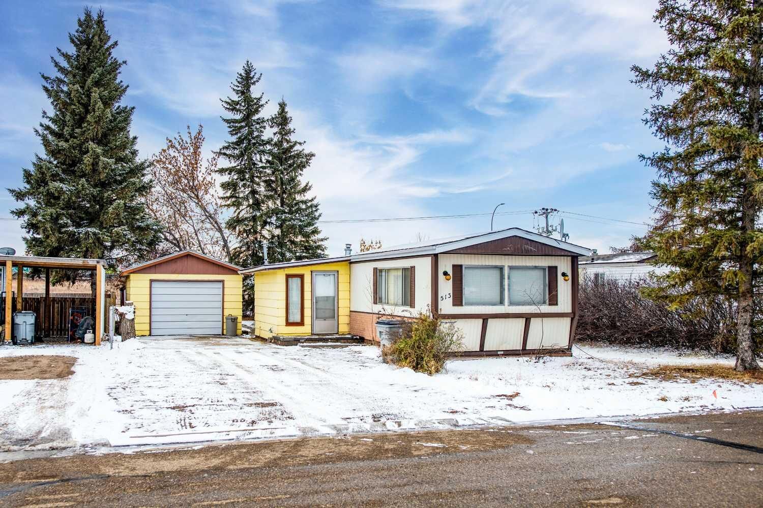 Property Photo: 513 2 Avenue Crescent AB T9W 1A3