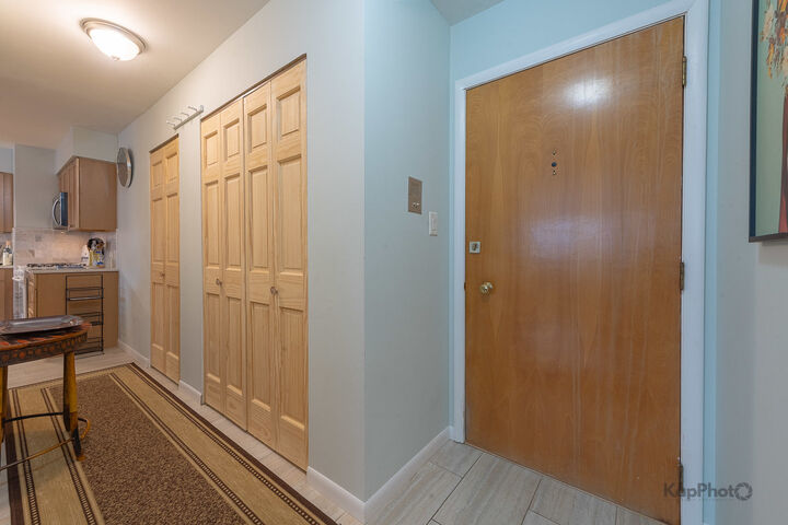 Property Photo: 4820 Conrad Street 202 IL 60077