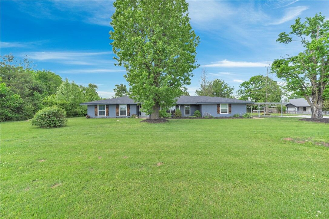 Property Photo:  1003 W Price Lane  AR 72758 