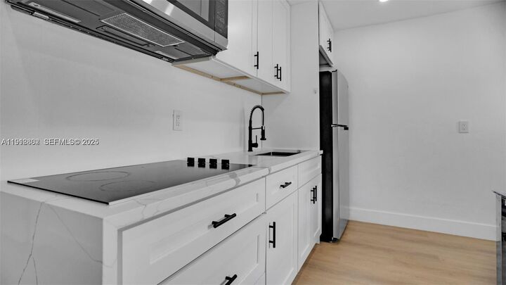 Property Photo: 32 SW 9th St 3 FL 33009