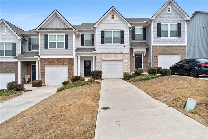 Property Photo: 5656 Union Pointe Drive GA 30291