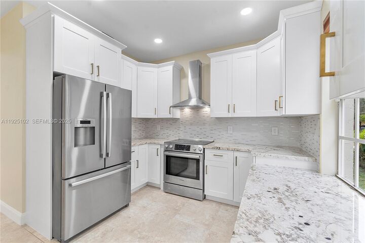 Property Photo: 5310 NW 124th Way FL 33076