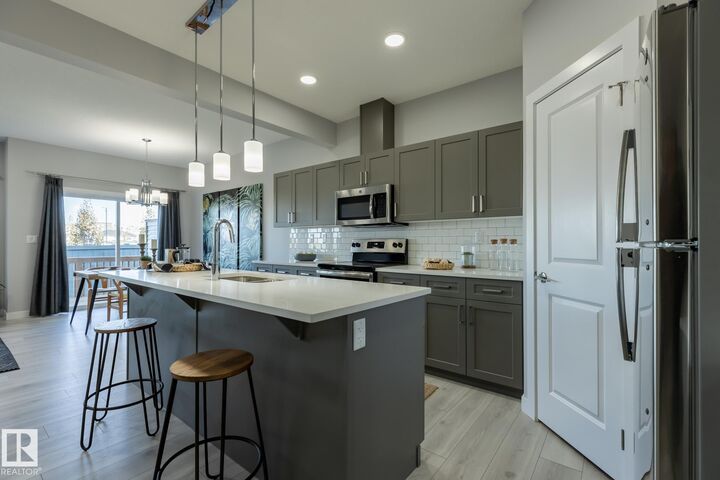 Property Photo: 307 27 Street SW AB T6X 3H9