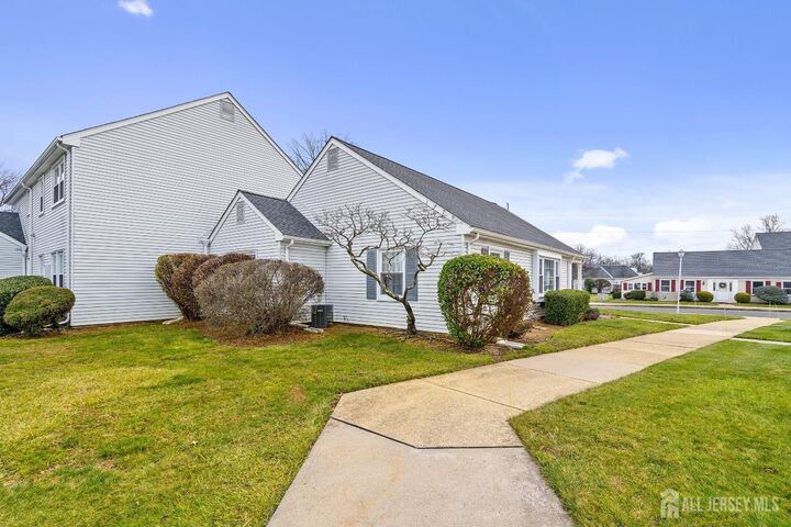 Property Photo:  142 Providence Way C  NJ 08831 