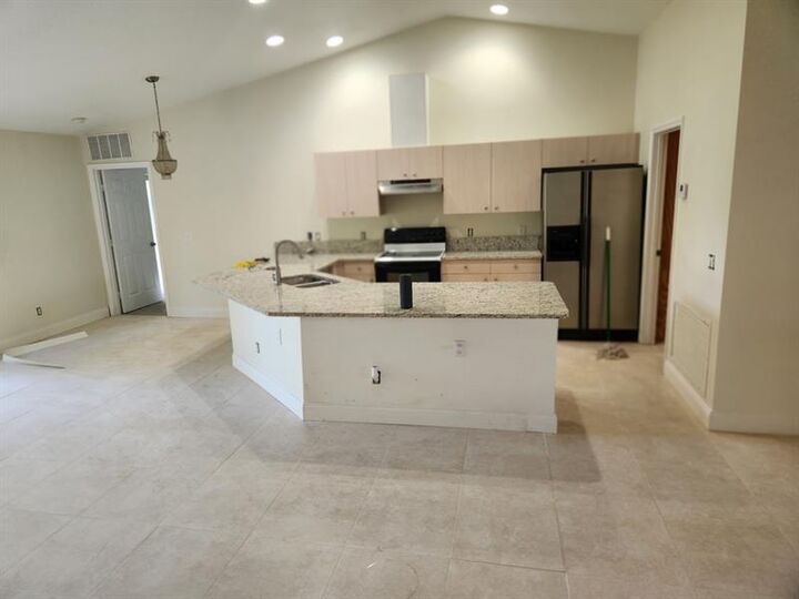 Property Photo: 1470 SW Sudder Ave FL 34953