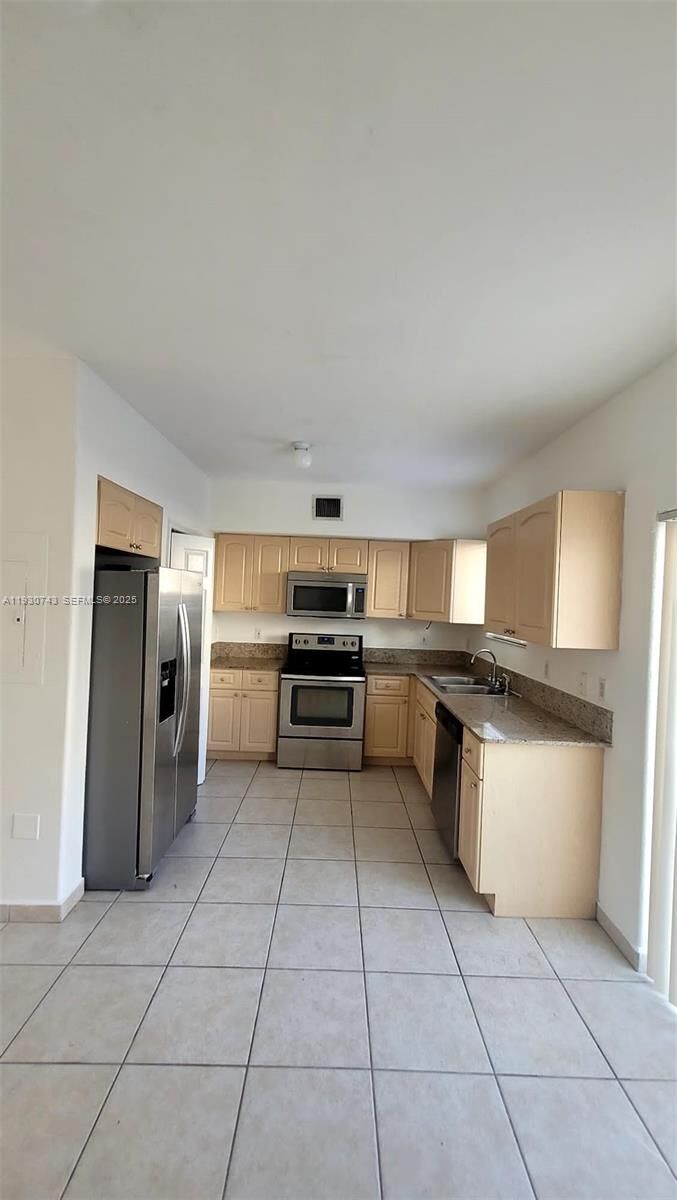 Property Photo:  7241 NW 174th Ter 103  FL 33015 
