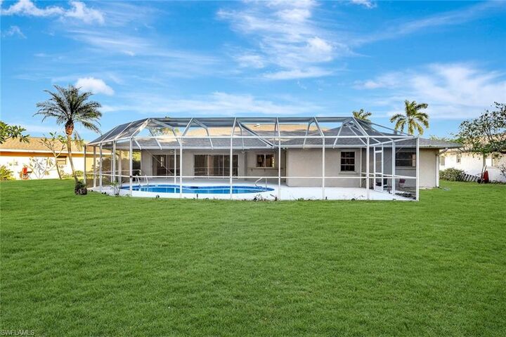 Property Photo: 307 Country Club Dr FL 34110