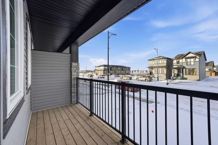 Property Photo:  313 Cobblestone Gate SW  AB T4B 5W4 