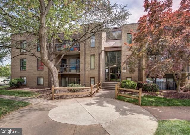 Property Photo:  11051 Camfield Court 204  VA 20109 