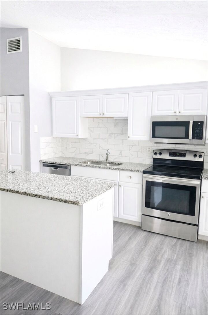 Property Photo:  5364 16th Place SW H3  FL 34116 