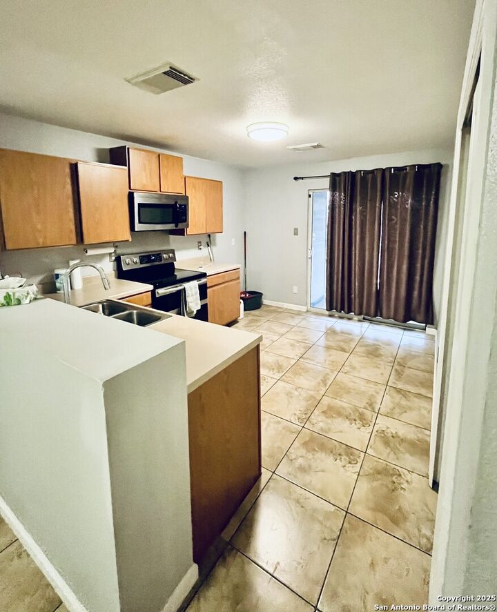 Property Photo:  10302 Shady Meadows  TX 78245 