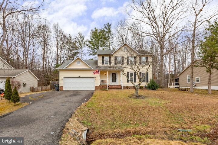 Property Photo:  11621 Enchanted Woods Way  VA 22407 