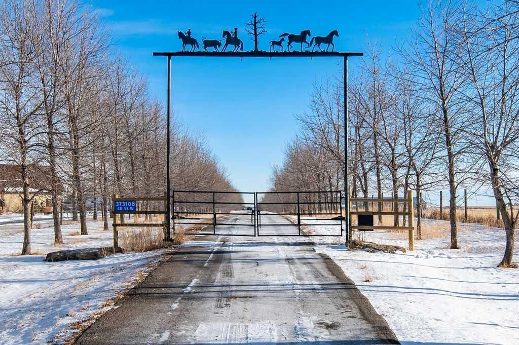 Property Photo:  373108 48 Street W  AB T1S 6B9 