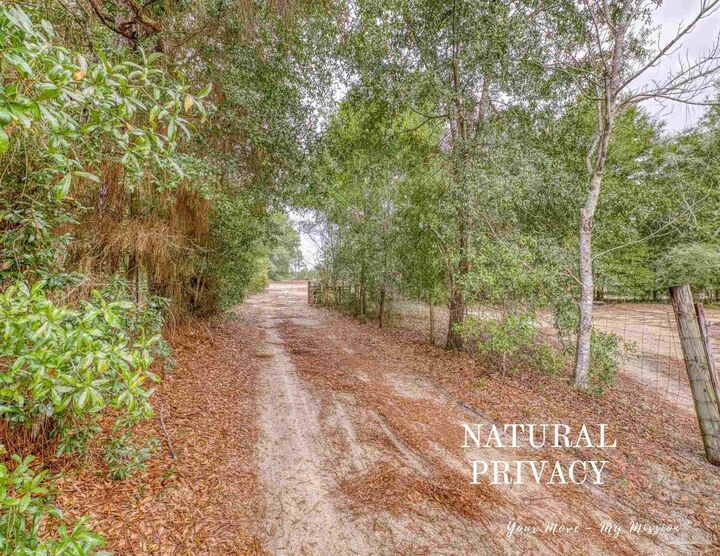 Property Photo:  10246 Nichols Lake Rd  FL 32583 