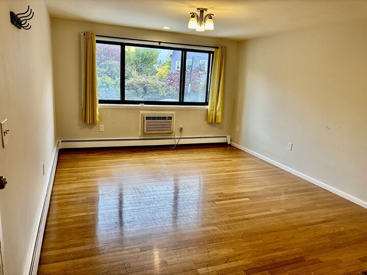 Property Photo:  2192 Massachusetts Ave 1/4  MA 02140 