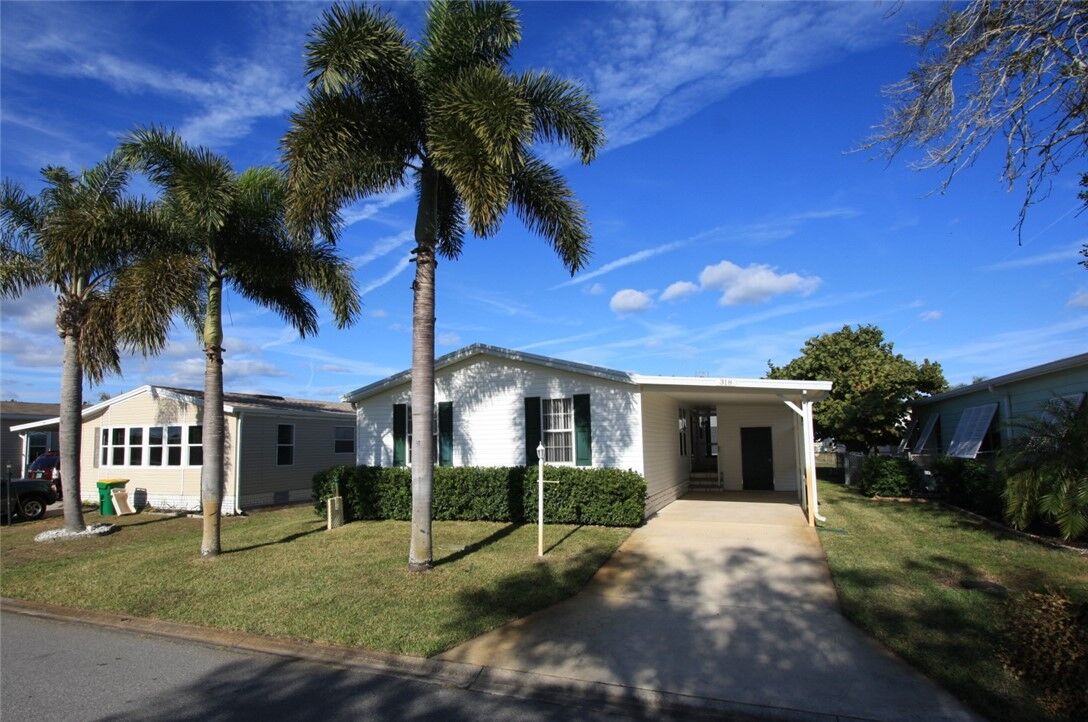 Property Photo:  318 Macadamia Drive  FL 32976 
