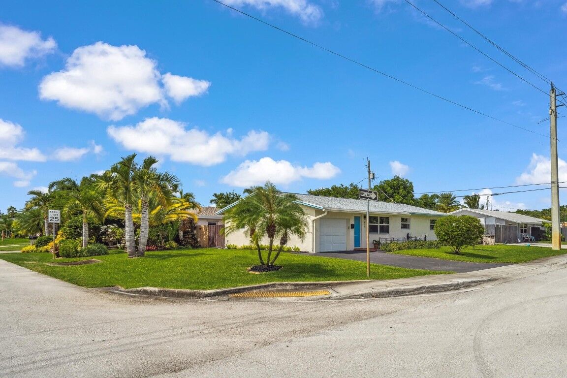 Property Photo:  317 NW 48th Court  FL 33309 