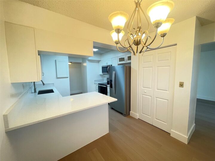 Property Photo:  1470 W 41st Street 201  FL 33012 