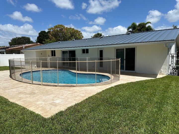 Property Photo:  1600 NE 59th Place  FL 33334 