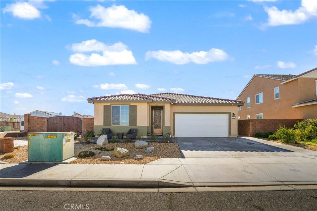 Property Photo:  11695 Iverson  CA 92392 