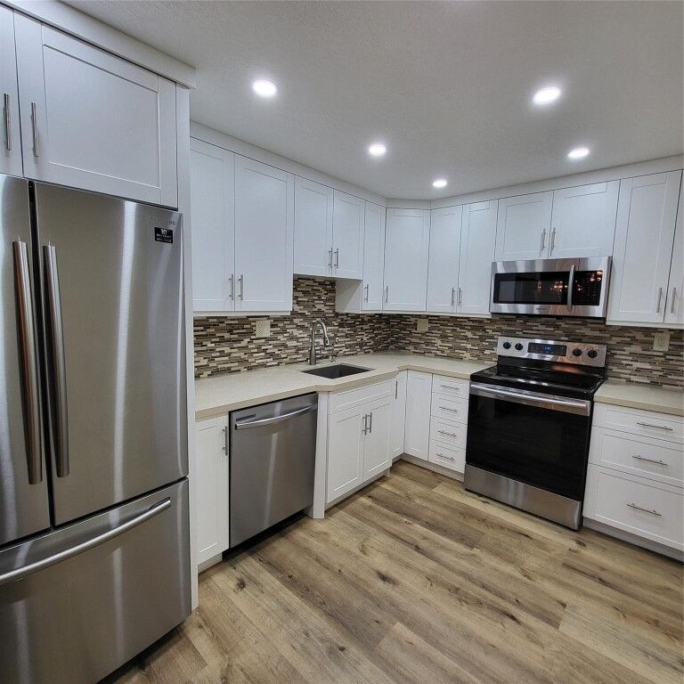 Property Photo:  10777 W Sample Road 315  FL 33065 