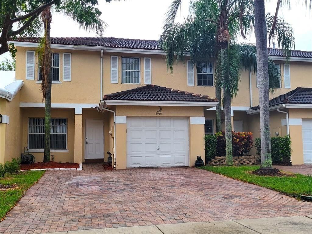 Property Photo: 8904 NW 53rd Court FL 33351