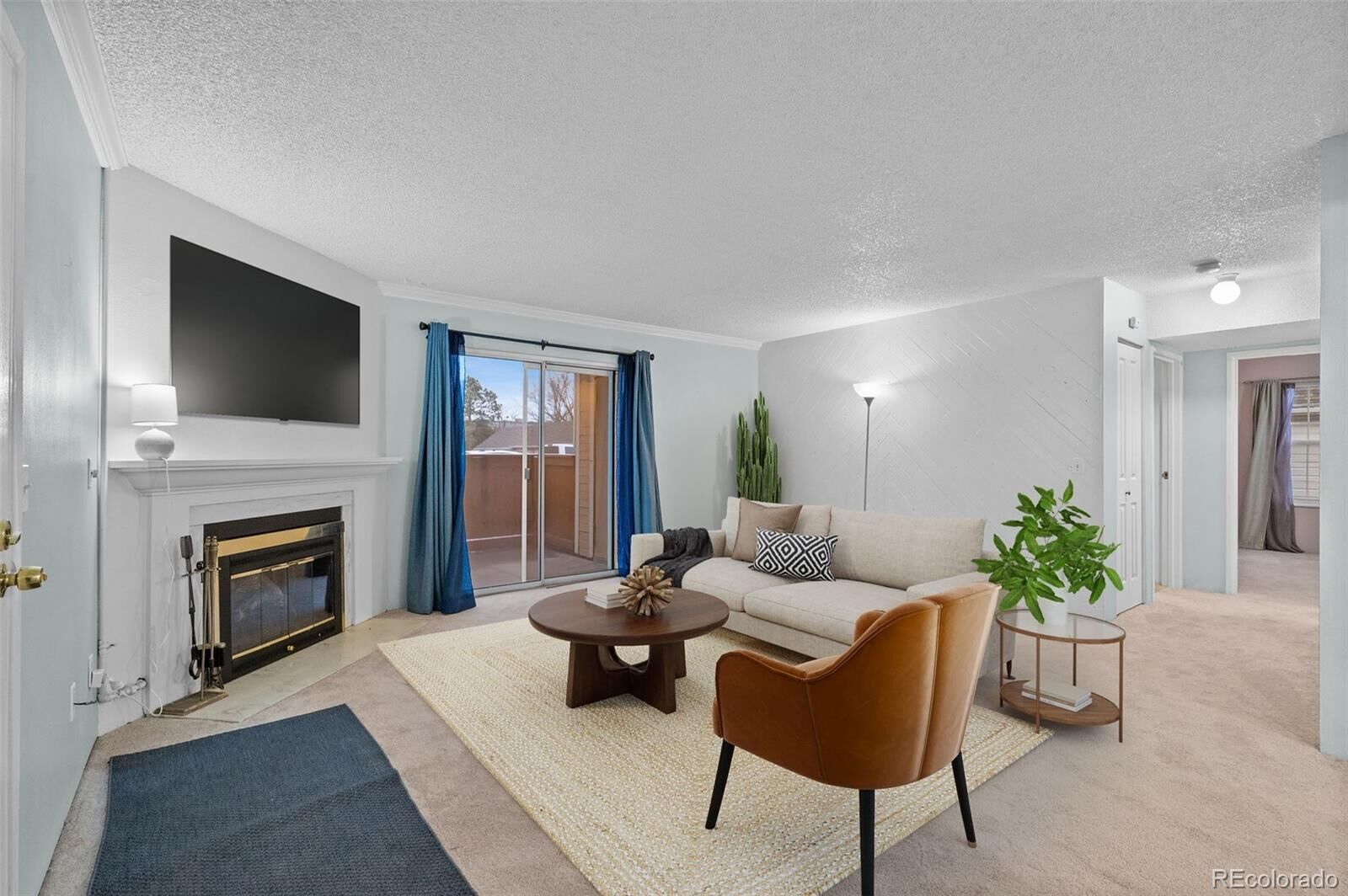 Property Photo:  3330 S Ammons Street 10-101  CO 80227 