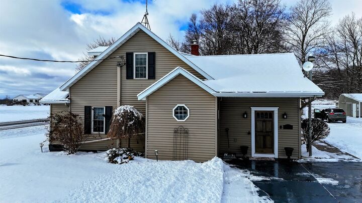 Property Photo:  6987 E Beaverton Road  MI 48617 