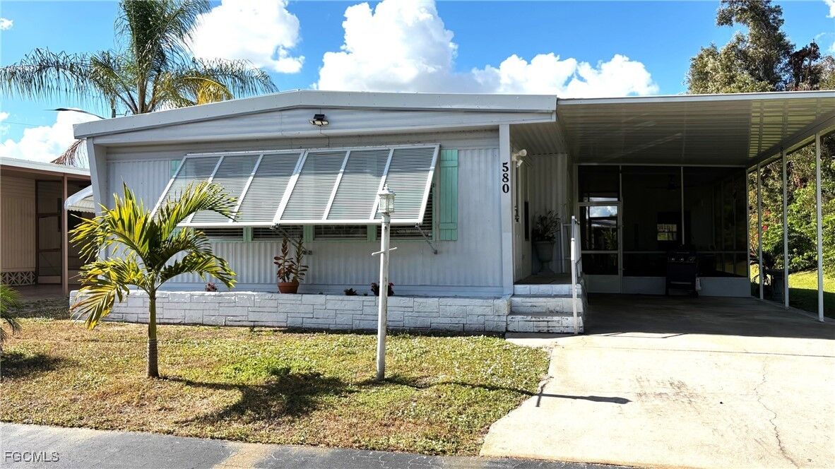 Property Photo:  580 Winning Way  FL 33917 