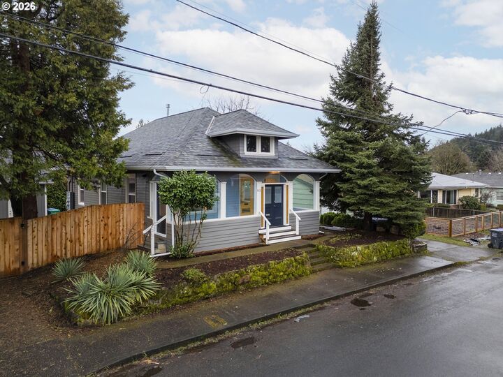 Property Photo:  8130 SE Madison St  OR 97215 