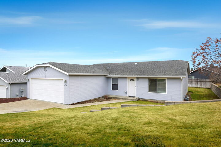 Property Photo:  7702 Douglas Dr  WA 98908 