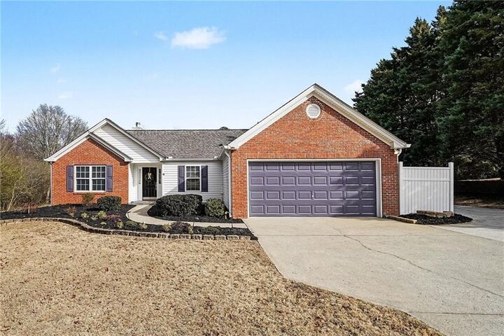 Property Photo:  8195 River Hill Commons Drive  GA 30107 