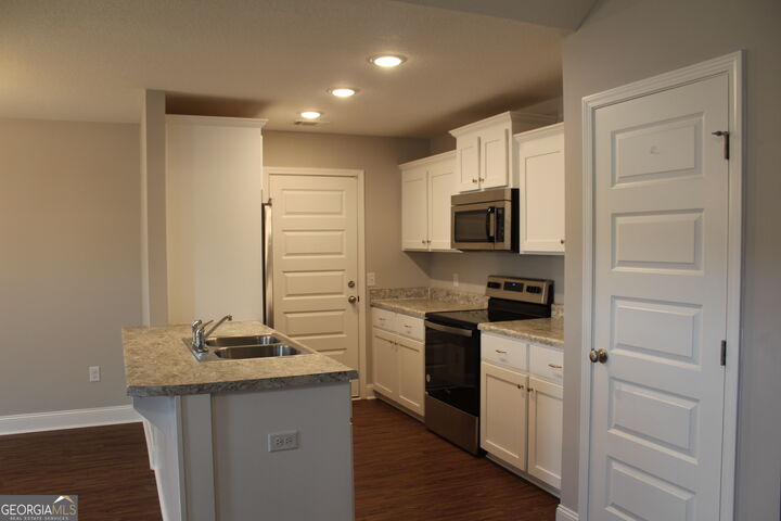 Property Photo:  7040 White Pine Avenue  GA 30458 