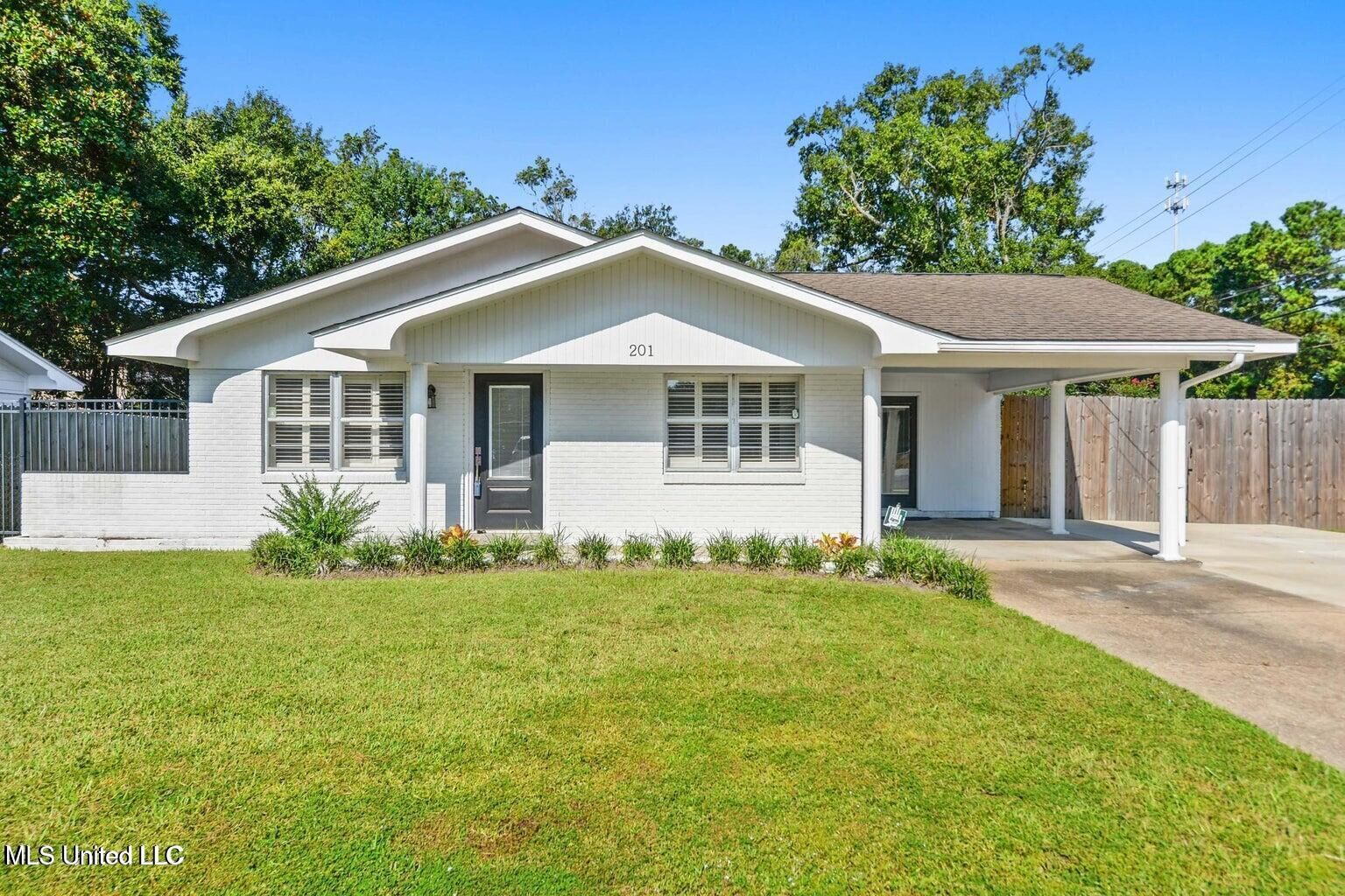 Property Photo:  201 Walnut Drive  MS 39564 