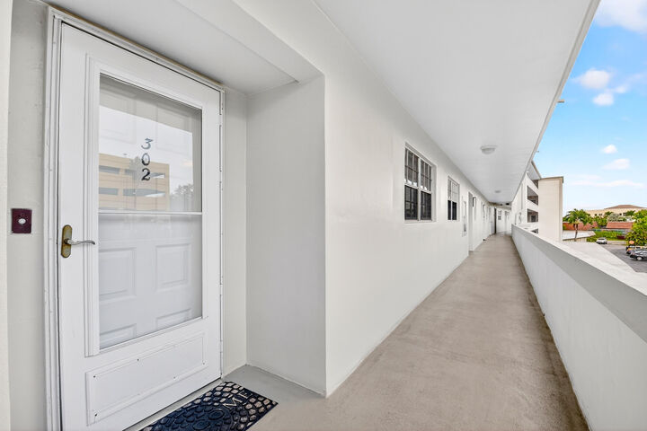 Property Photo:  250 John F Kennedy Drive 302  FL 33462 