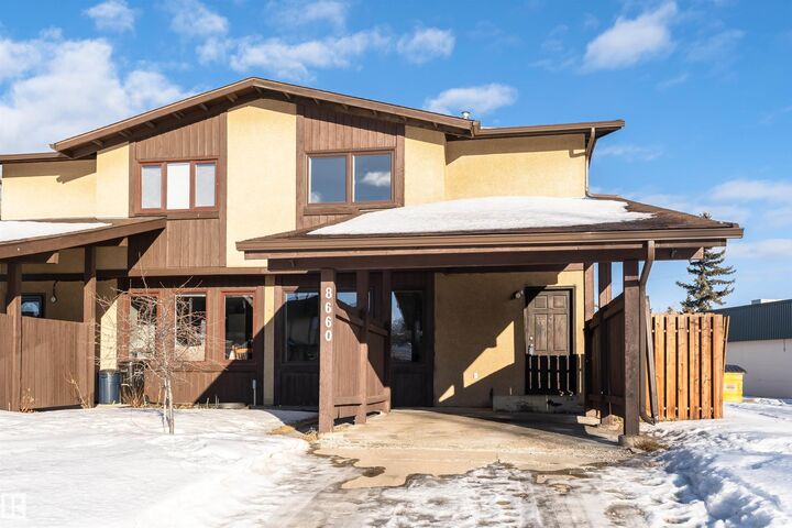 Property Photo:  8660 27 Avenue NW  AB T6K 2X4 