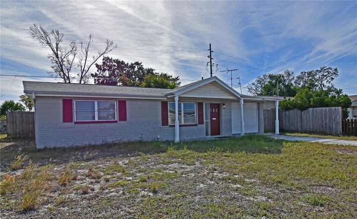 Property Photo:  7724 Coventry Drive  FL 34668 