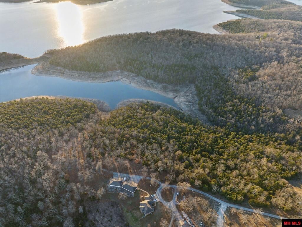 Property Photo:  397-00001-005 Burggraf Trail  AR 72653 