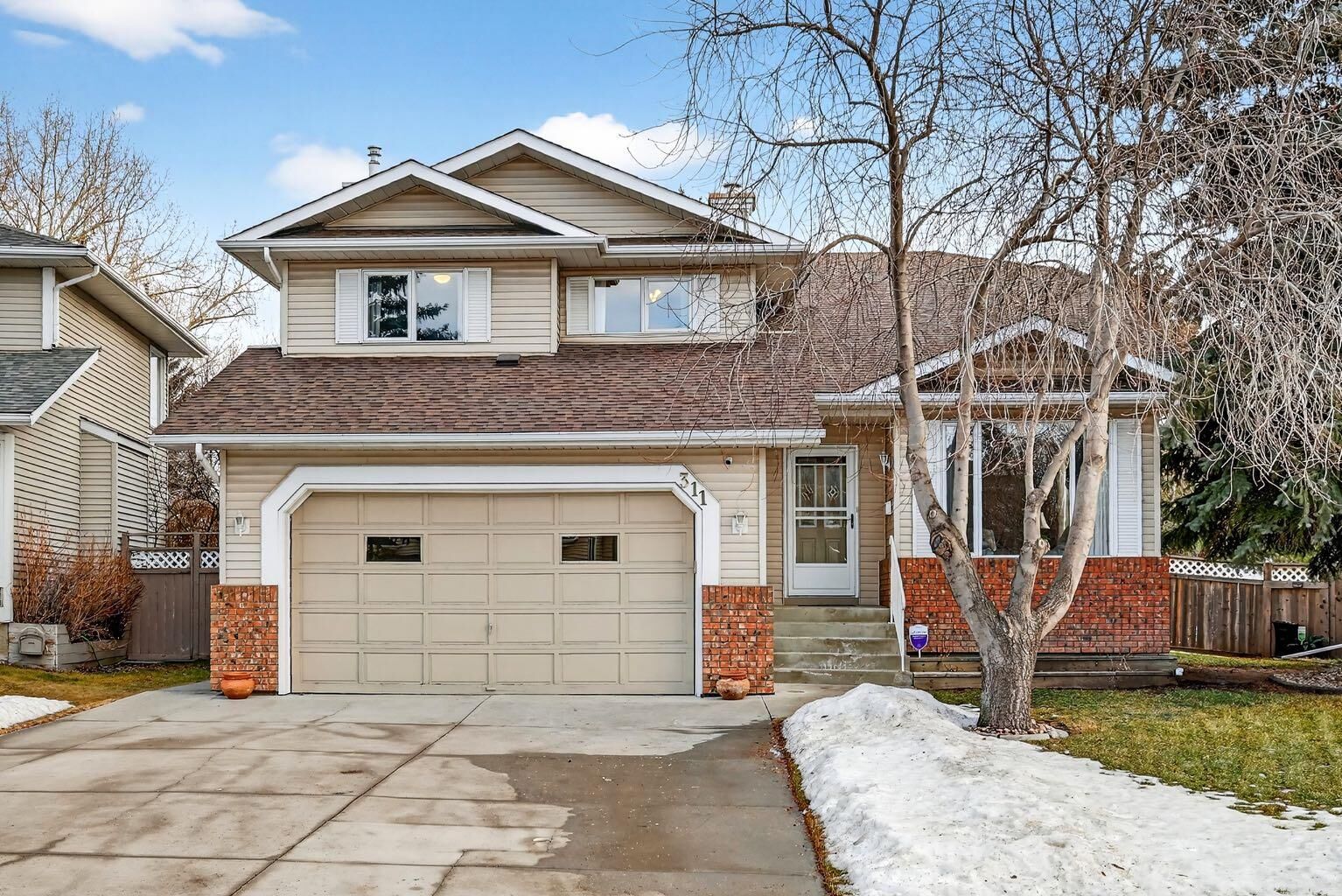Property Photo:  311 Douglasbank Drive SE  AB T2Z 2C7 