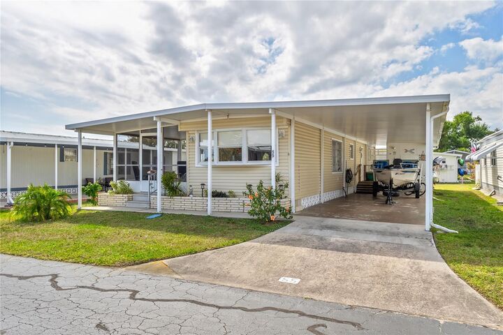 Property Photo:  24437 Harborview Road 55  FL 33980 