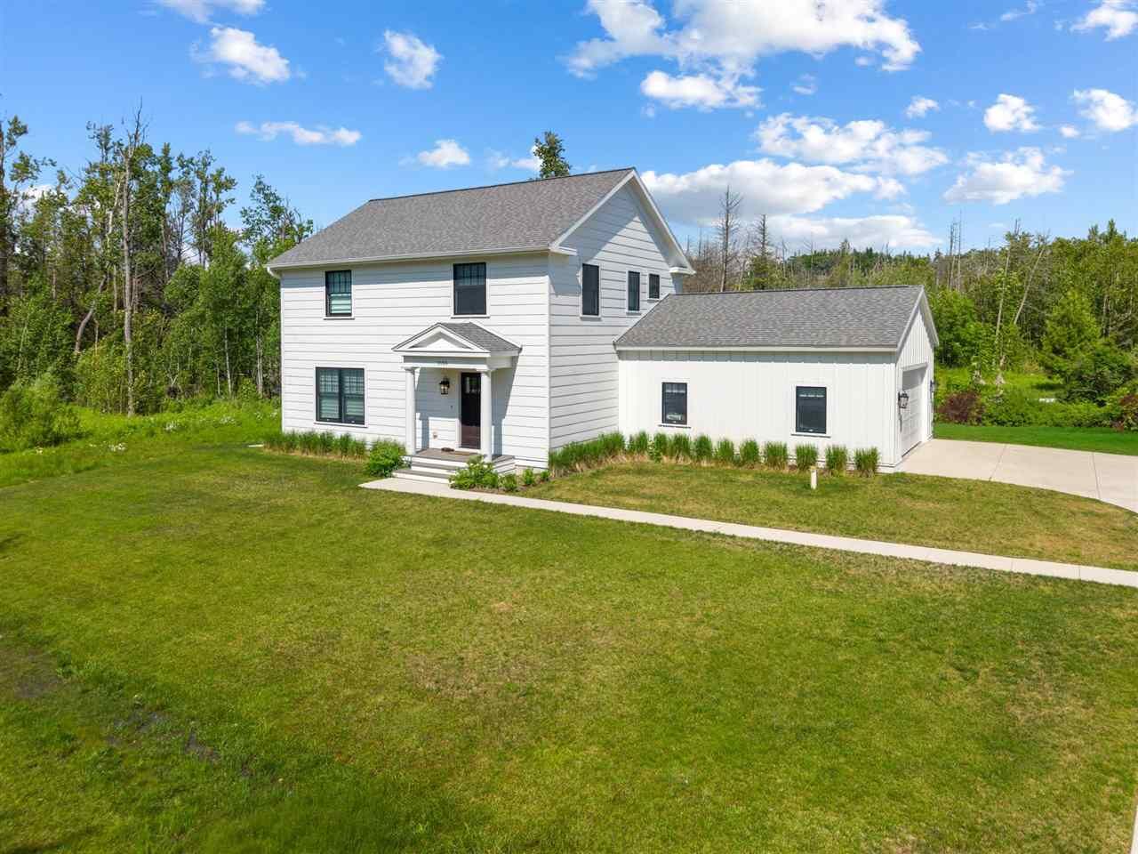 Property Photo:  1056 Woodridge  MI 49770 