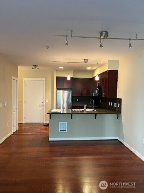 Property Photo:  180  Harbor Square Loop NE B118  WA 98110 