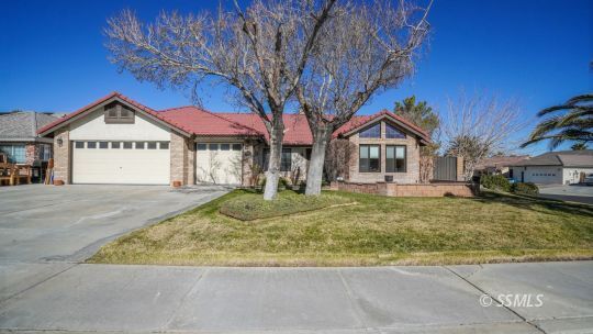 Property Photo:  108 W Smoke Tree Ave  CA 93555 