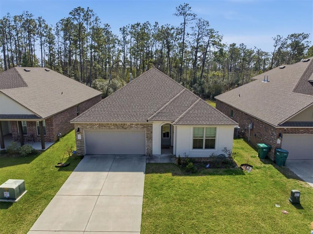 Property Photo:  1716 Sawgrass Drive  LA 70669 