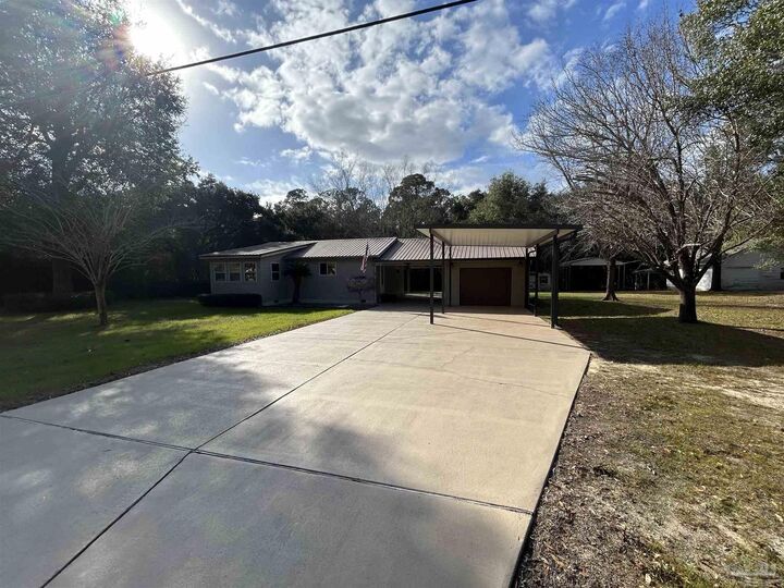 Property Photo:  8601 Redwing Dr  FL 32534 
