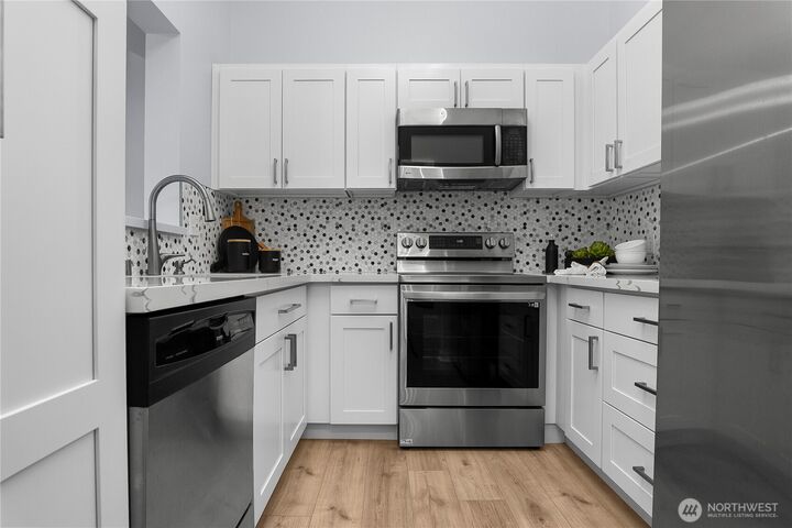 Property Photo:  12905  126th Court NE L205  WA 98034 